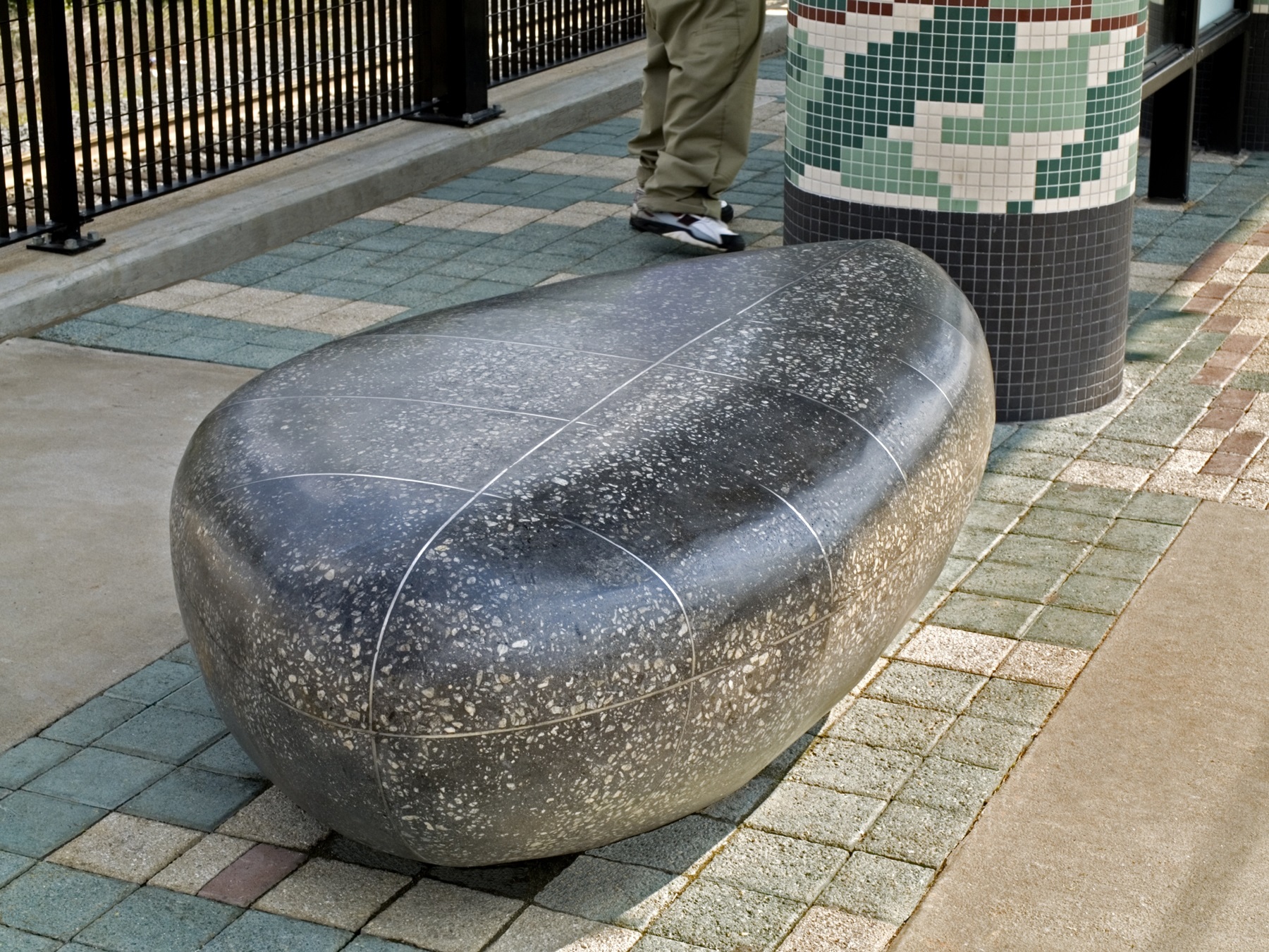 Bench art at a rail platform